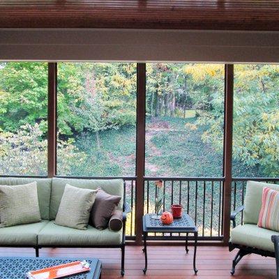 Furnished screened porch with fall colors